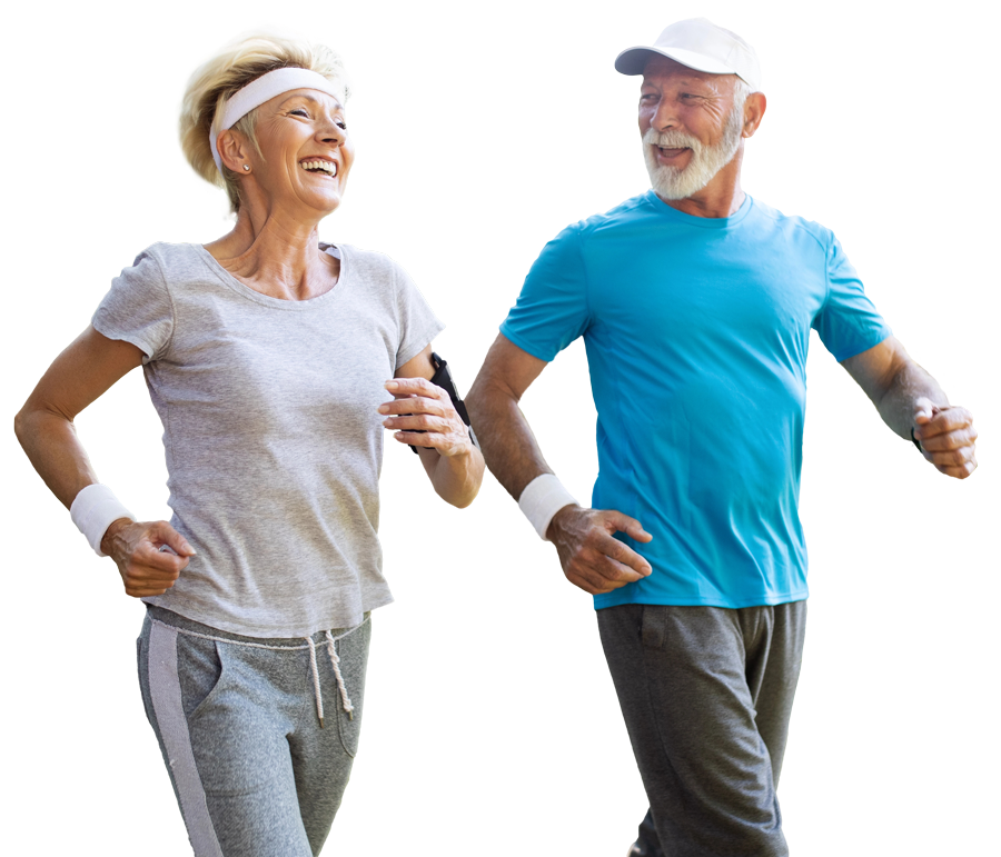 Older couple jogging and laughing together